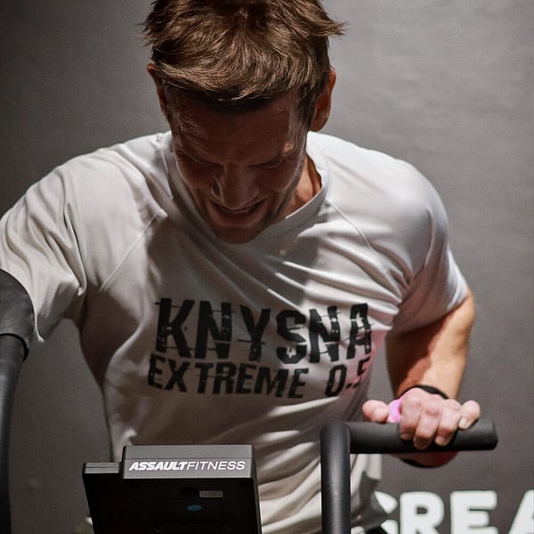 Two athletes cheering each other on at CrossFit Ari