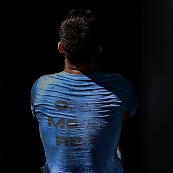 Athlete wearing a 'Just One More Rep' shirt from behind at CrossFit Ari